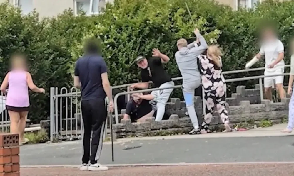 Street fight breaks out between families wielding studded planks and metal poles | News UK
