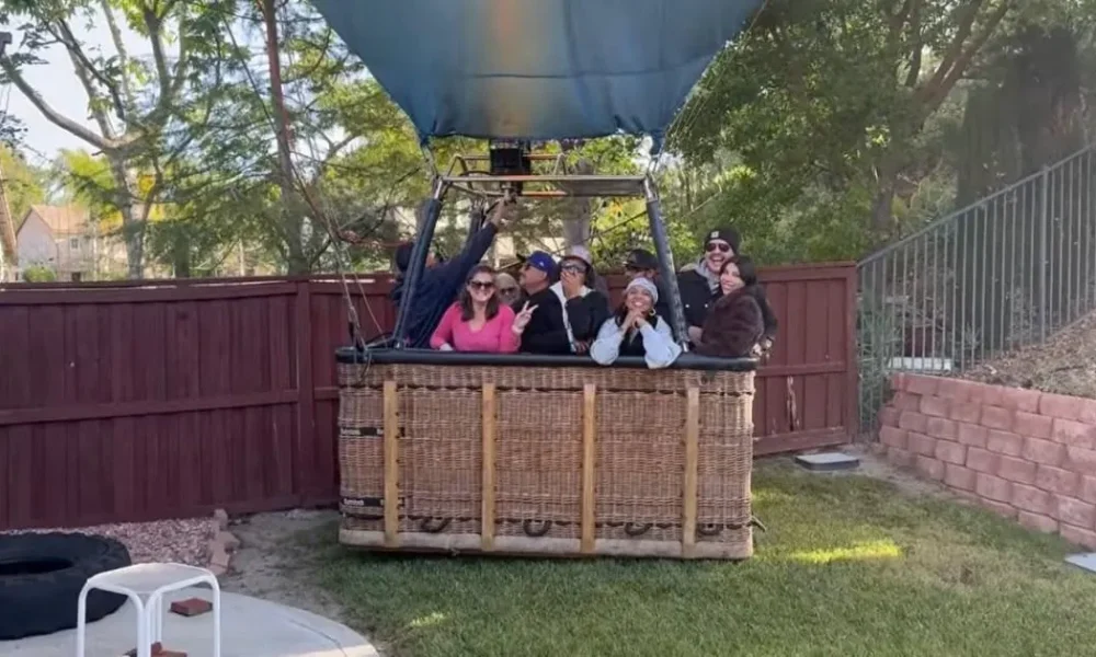 Man sees the funny side after hot air balloon carrying 13 people lands in his garden | News US