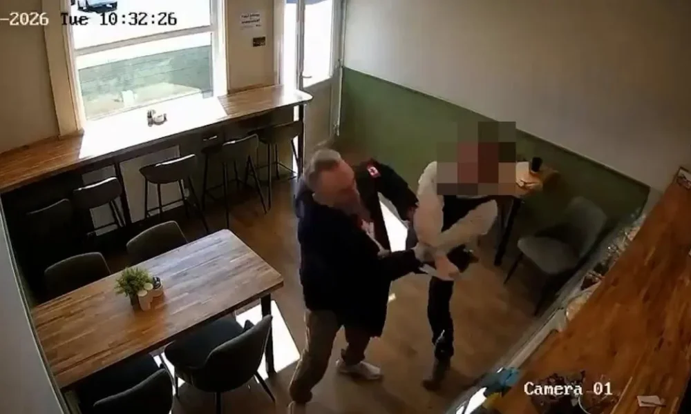 Knife attack victim 'saved by gilet' after man bursts into cafe and stabs him | News UK