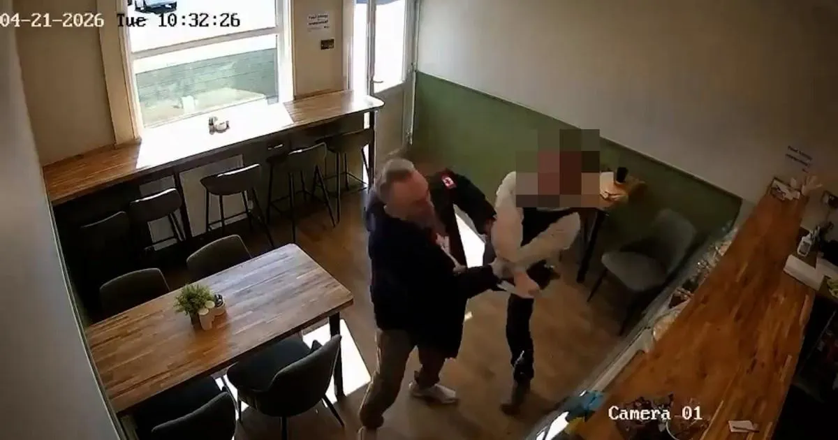 Knife attack victim 'saved by gilet' after man bursts into cafe and stabs him | News UK