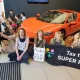 Take Back Power supporters stage a sit-in in a Ferrari dealership