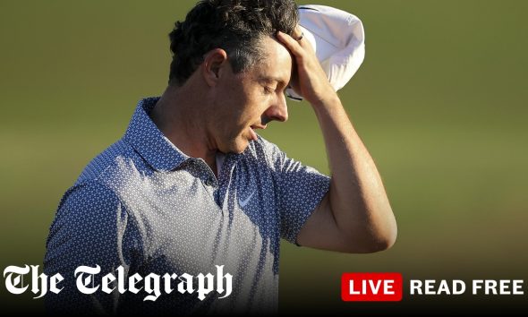 McIlroy hangs on for share of lead after madcap third round