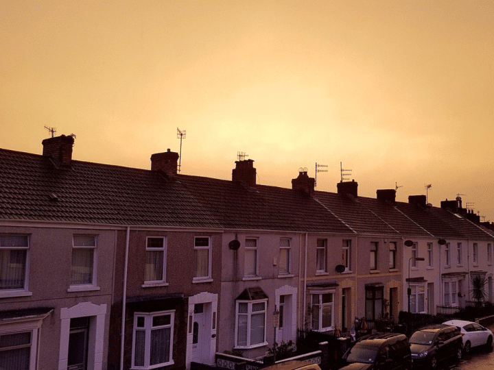 A row of terraced houses in England in foggy conditions. Rachel Reeves is considering acting "amid growing alarm in government about the impact of the Iran war on voters’ budgets," the Guardian reported on Monday 27 April 2026