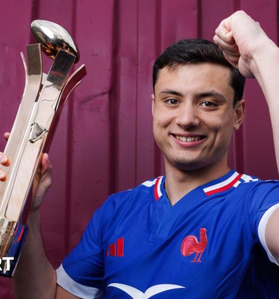 Louis Bielle-Biarrey with the player of the championship trophy