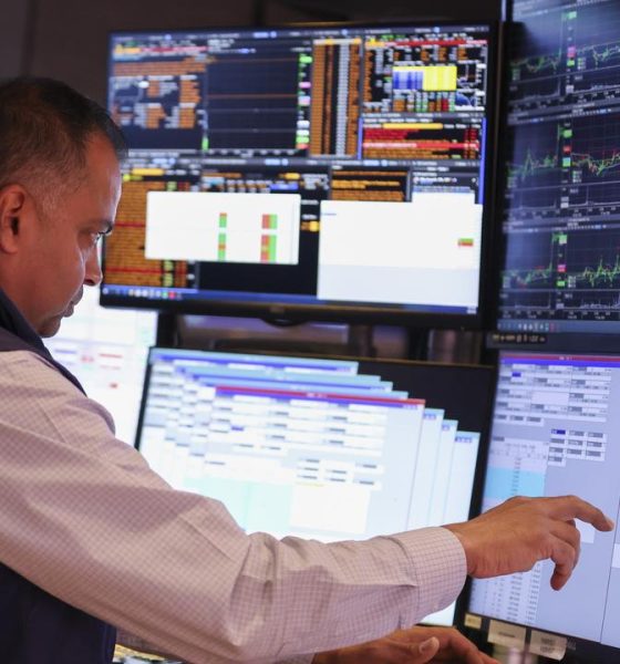 Wall St ends mixed as investors parse Iran negotiations