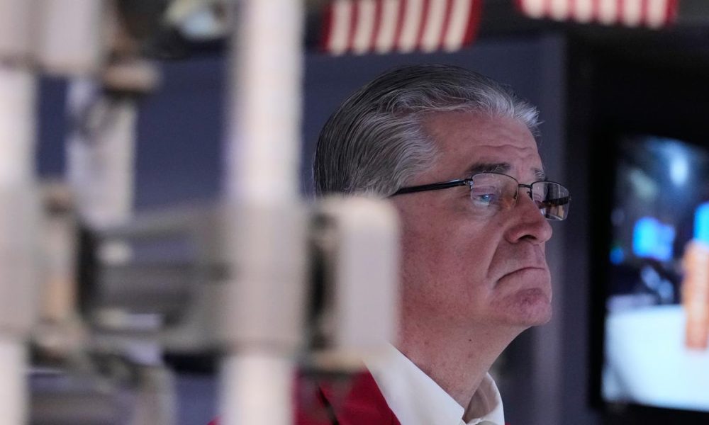 Wall St closes slightly down on renewed US-Iran tension