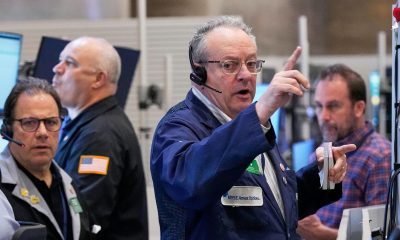 Wall St higher in cautious start to big earnings week