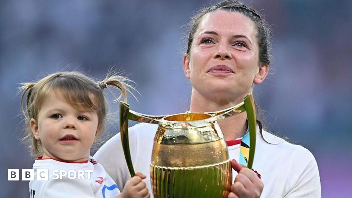 Lark Atkin-Davies and Abbie Ward with children on the Allianz Stadium pitch