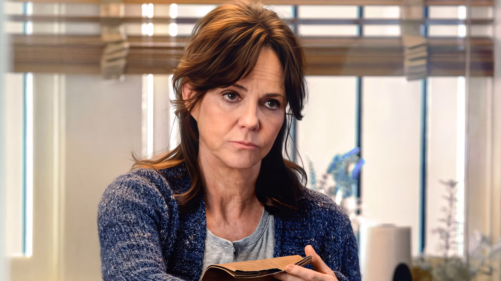 Sally Field looking at someone skeptically in Amazing Spider-Man 2