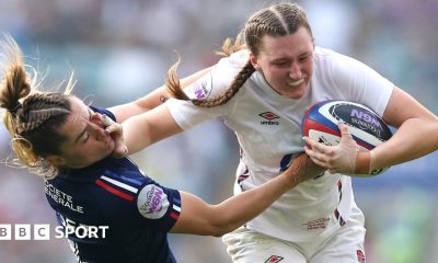 England full-back Emma Sing hands off France's Joanna Grisez