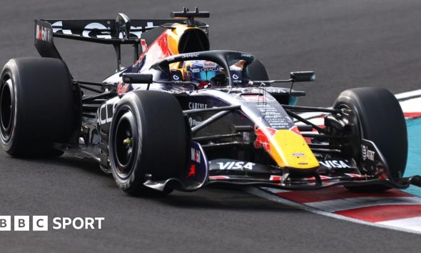 Red Bull's Max Verstappen drives across a kerb during the 2026 Japanese Grand Prix