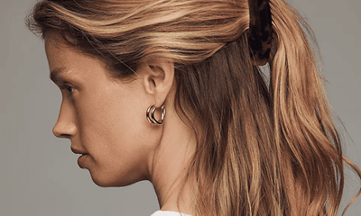 woman wears banana claw clip in a tortoiseshell print