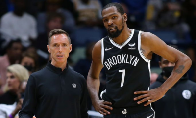 Brooklyn Nets head coach Steve Nash (L) and Kevin Durant (R) chat during a game against the New Orleans Pelicans at the Smoothie King Center on November 12, 2021.