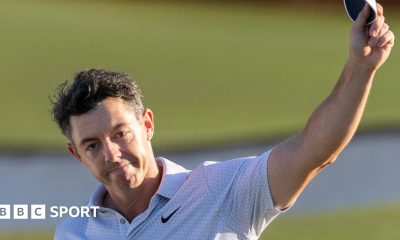 Rory McIlroy waves his cap to the Masters crowd