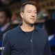 Former Chelsea player John Terry walks along the touchline at Stamford Bridge ahead of a Premier League 2 youth match in 2025