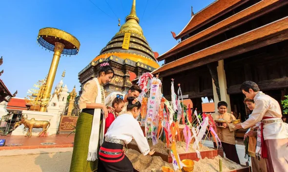 A Timeless Tradition of Splashing Through Generations