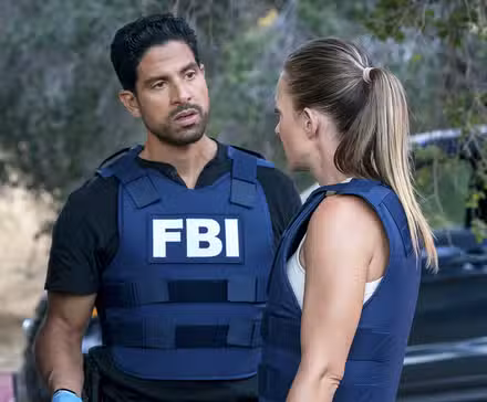 AJ Cook and Adam Rodriguez talking in Criminal Minds 