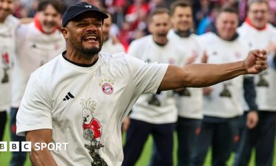 Bayern Munich players line up to celebrate winning the Bundesliga title