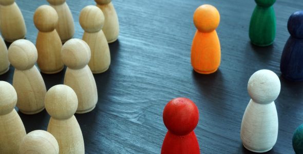 diversity & inclusion concept with wooden and colored figures