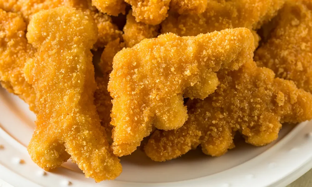 Dinosaur chicken nuggets sold at Walmart may pose lead risk, federal alert says