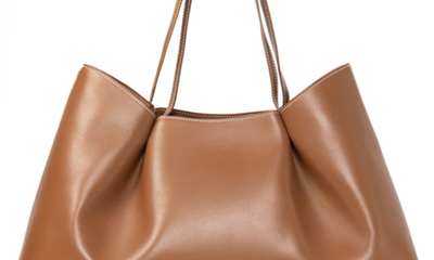 tan tote bag with dimpled details