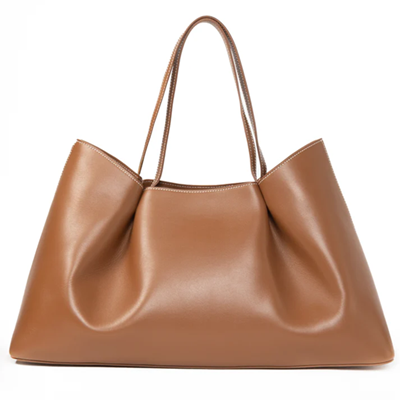 tan tote bag with dimpled details