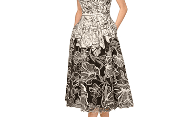 beautiful cream and black embroidered dress with pockets