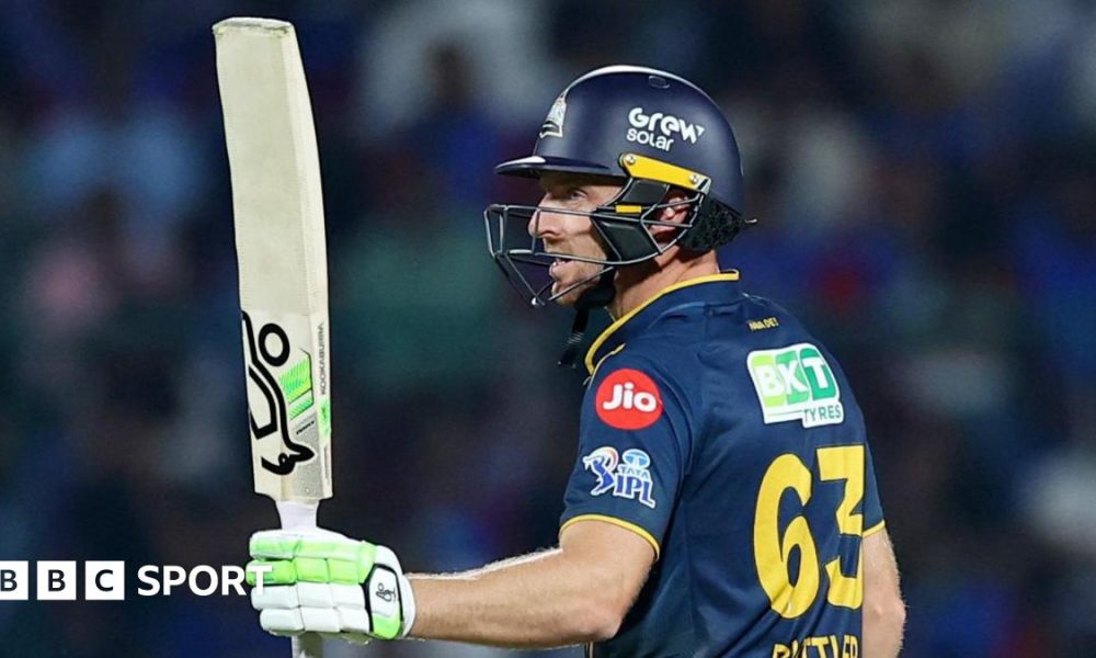 Jos Buttler salutes the crowd after reaching fifty for Gujarat Titans