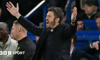 Man Utd manager Michael Carrick holds his arms out