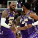 LeBron James and son Bronny on court for LA Lakers against Golden State Warriors