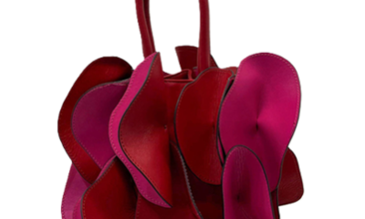 red and pink leaher bag that looks a bit like a flower