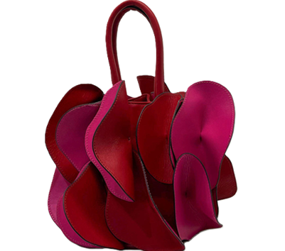 red and pink leaher bag that looks a bit like a flower