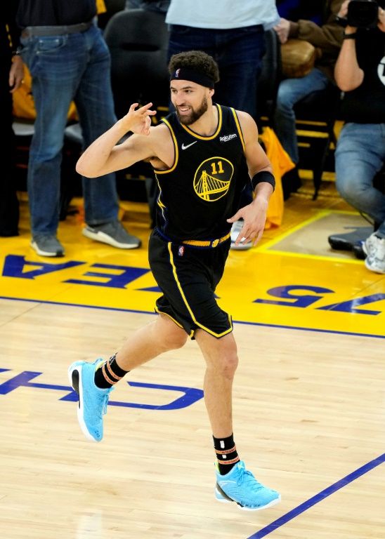 Golden State guard Klay Thompson celebrates a 3-pointer in Thursday's 120-110 victory over Dallas that advanced the Warriors into the NBA Finals