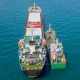 Refuelling at sea, Aerial image of a Small Oil products ship fuelling a large Bulk carrier.