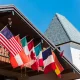 Clock Tower and Chalet Building with Flags in Vail, Colorado