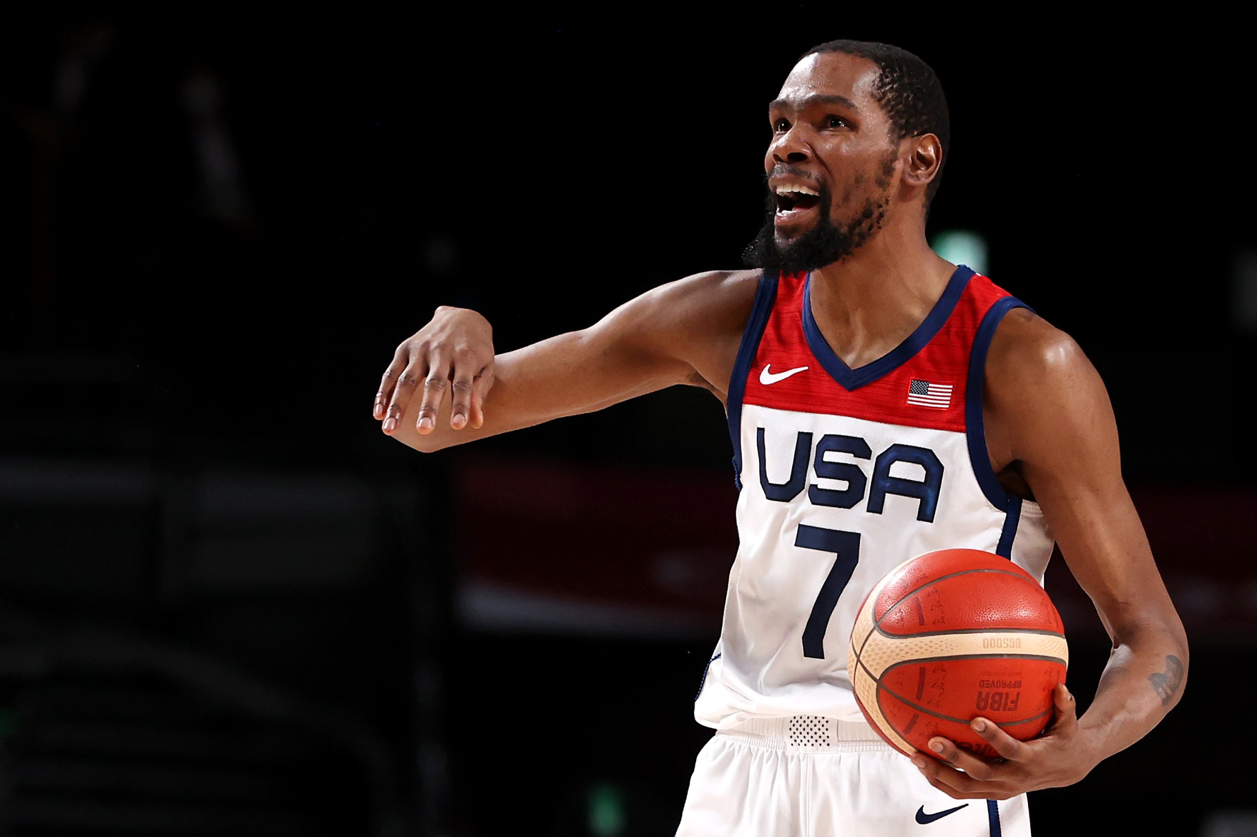 Kevin Durant #7 of Team United States reacts against Team Australia during the first half of a Men's Basketball quarterfinals game on day thirteen of the Tokyo 2020 Olympic Games at Saitama Super Arena on August 05, 2021 in Saitama, Japan.