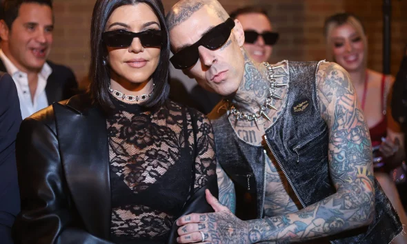 Kourtney Kardashian and Travis Barker at fashion show