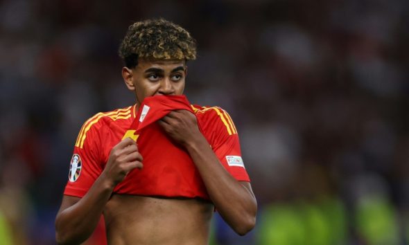 LeBron James #23 of the Los Angeles Lakers talks with a teammate during a game against the Chicago Bulls at the United Center on March 12, 2019 in Chicago, Illinois.