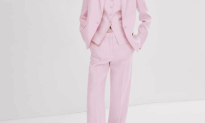 pink linen suit with black mary jane flats
