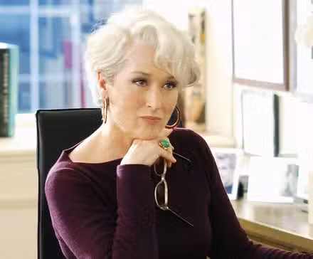 Miranda Priestly, looking at something off-camera while in her office in The Devil Wears Prada