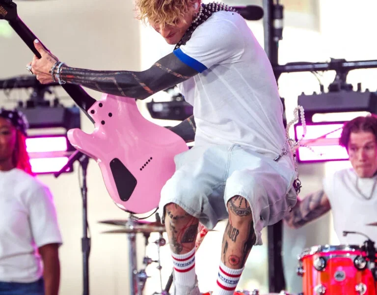 Machine Gun Kelly leaps into the air as he performs at the Today Show Citi Concert Series in New York City