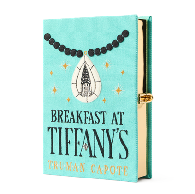 canvas clutch embroidered to look like the book BREAKFAST AT TIFFANY'S by Truman Capote