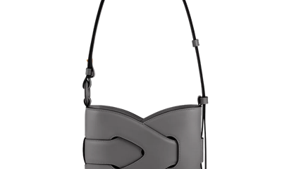 gray bag with twisty lock detail with leather