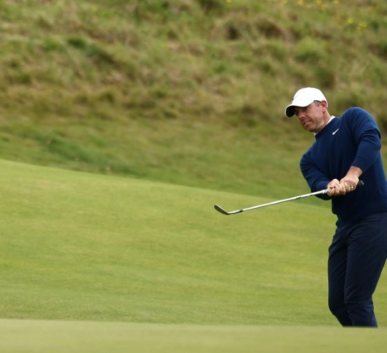 Rory McIlroy battled to stay in contention at the British Open