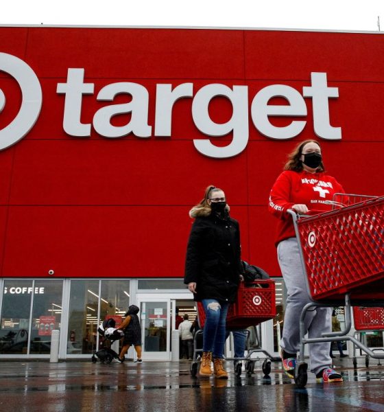 Shoppers exit a Target store during Black Friday sales in Brooklyn, New York, U.S., November 26, 2021.