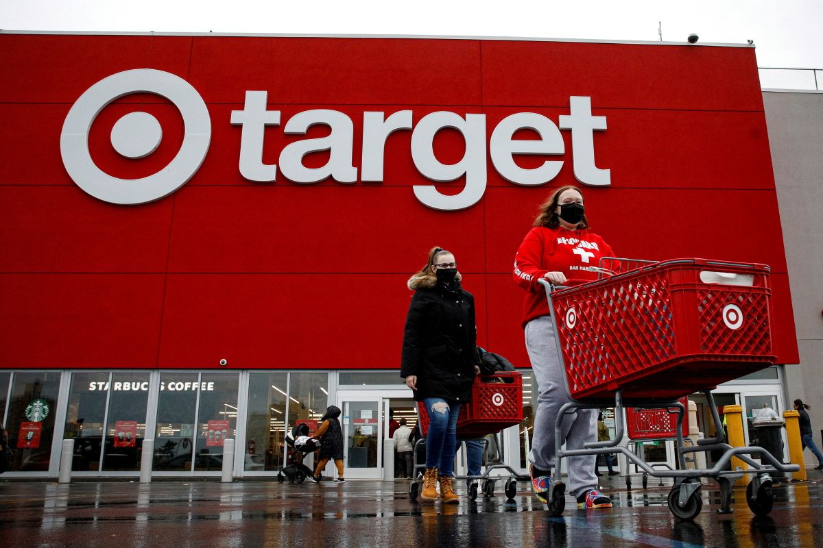 Shoppers exit a Target store during Black Friday sales in Brooklyn, New York, U.S., November 26, 2021.