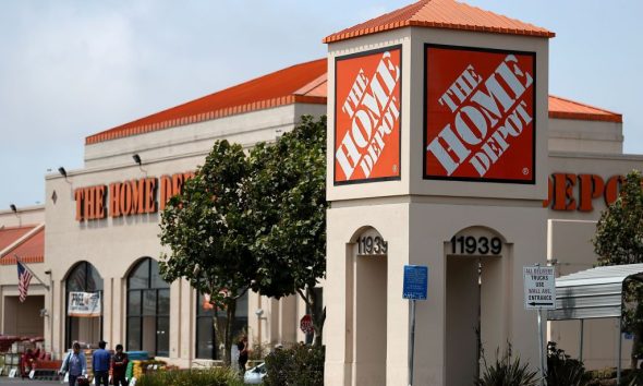 A sign is posted in front of a Home Depot store in El Cerrito, California. Home Depot reported less than sterling operating results for the quarter ended Feb. 3.