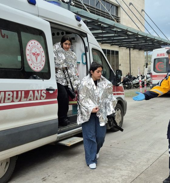 Rescued migrants, whose boat had capsized, arrive at a hospital in Bodrum, Turkey. Pic: Reuters
