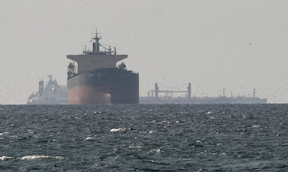 Cargo ships in the Gulf, near the Strait of Hormuz in March. Pic: Reuters