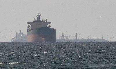 Cargo ships in the Gulf, near the Strait of Hormuz in March. Pic: Reuters